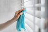 Cleaning window with a microfiber cloth
